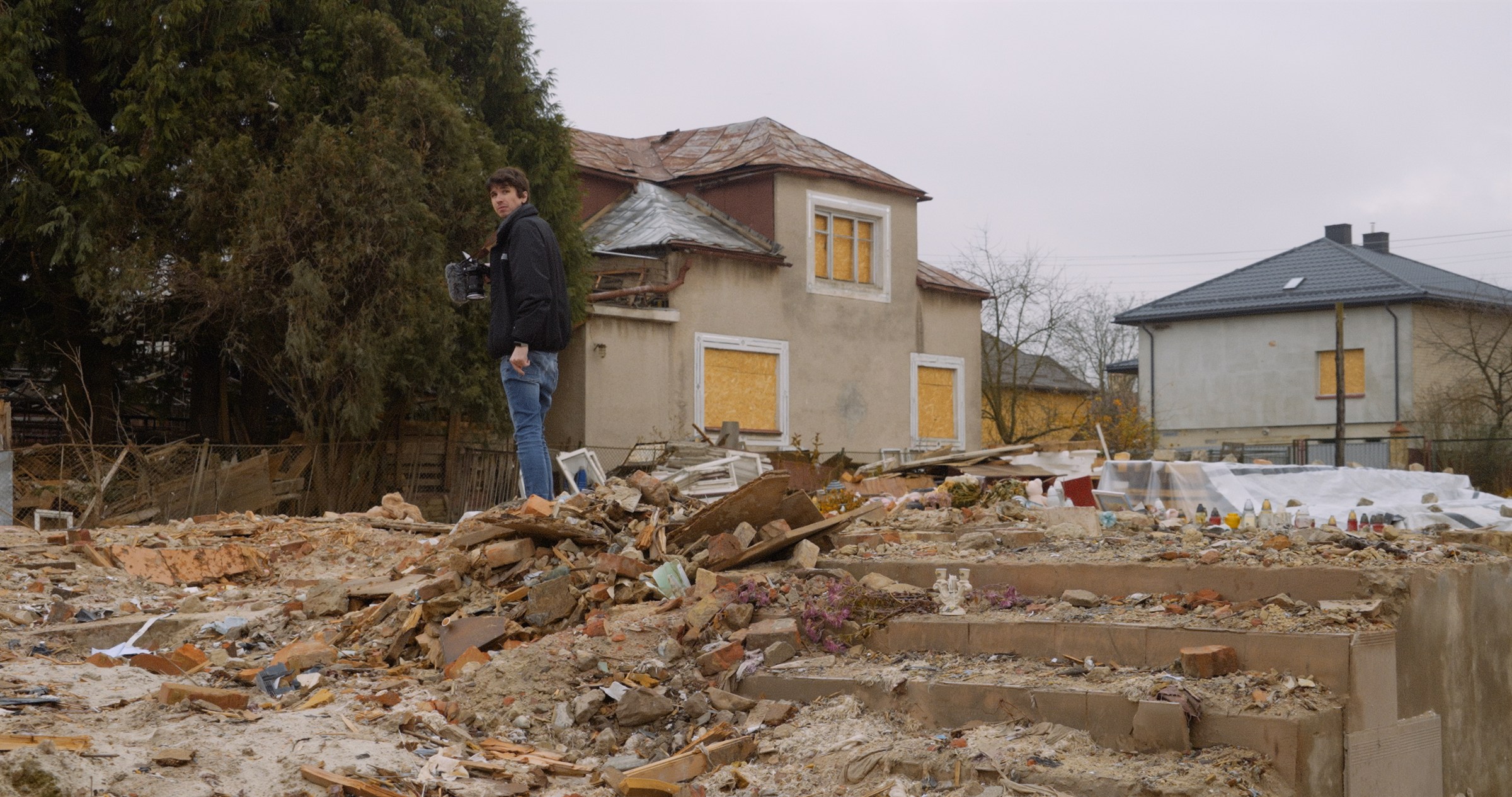 Shane Hatton filming among war-damaged homes in Ukraine